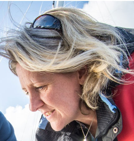 Head shot of Prof Liz Cottier Cook on fieldwork in a marina