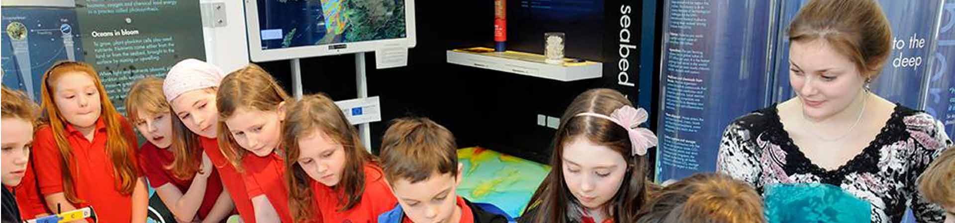 Visiting primary school children in our visitor centre with one of our science communication interns.
