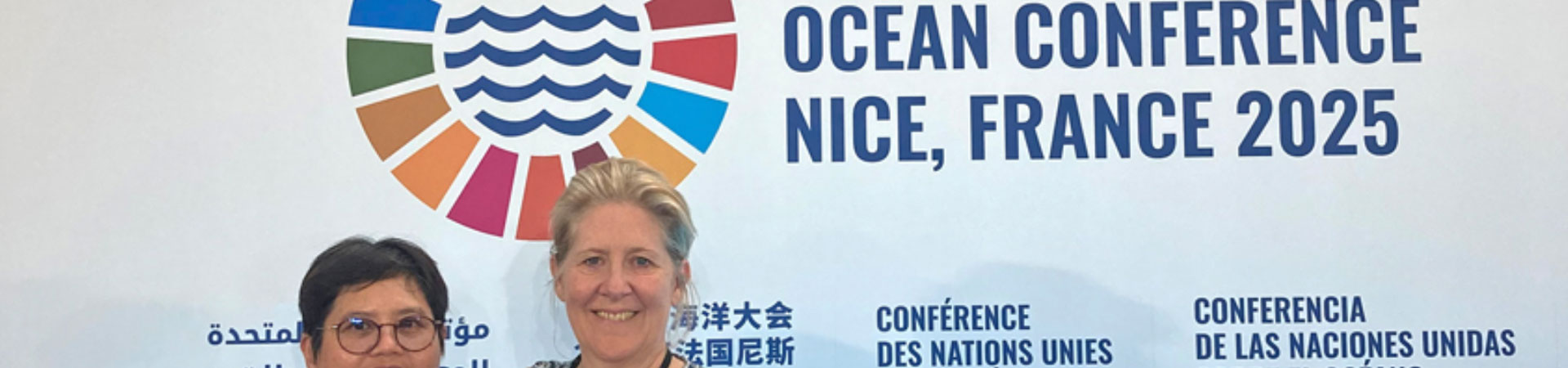 Two female scientists at the UN Oceans Conference 2025 presenting a new policy brief on seaweed