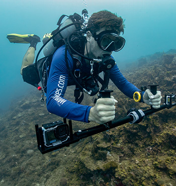 Ross diving in scuba gear.