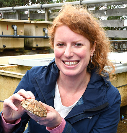 Dr Mairi Cowan holding an oyster shell