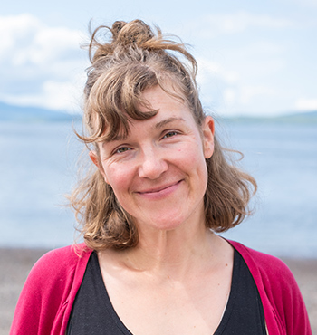 
        Dr Charlotte Spring on the SAMS beach 
        