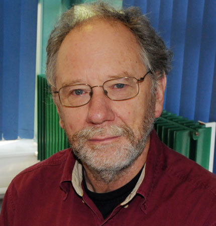 
        Head and shoulder photo of Professor Paul Tett in the office
        