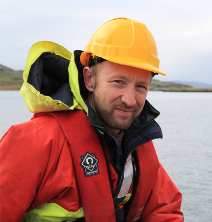 
        Image of Dr Tom Wilding on fieldwork
        