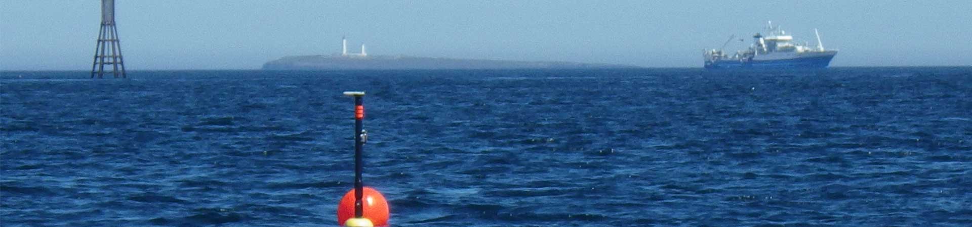 Photo of the MeyGen site in the Peatland Firth with tidal device, ship and monitoring technology