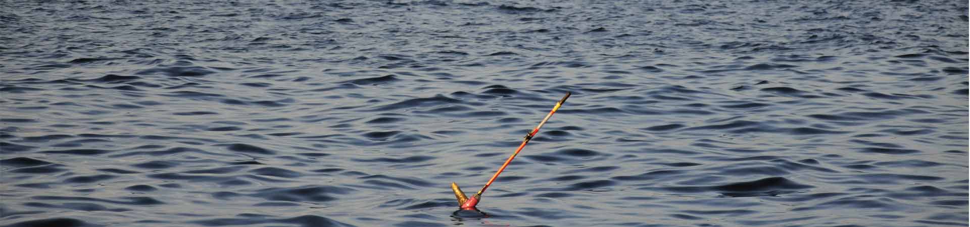 Shelf sea water surface with antenna of glider in foreground