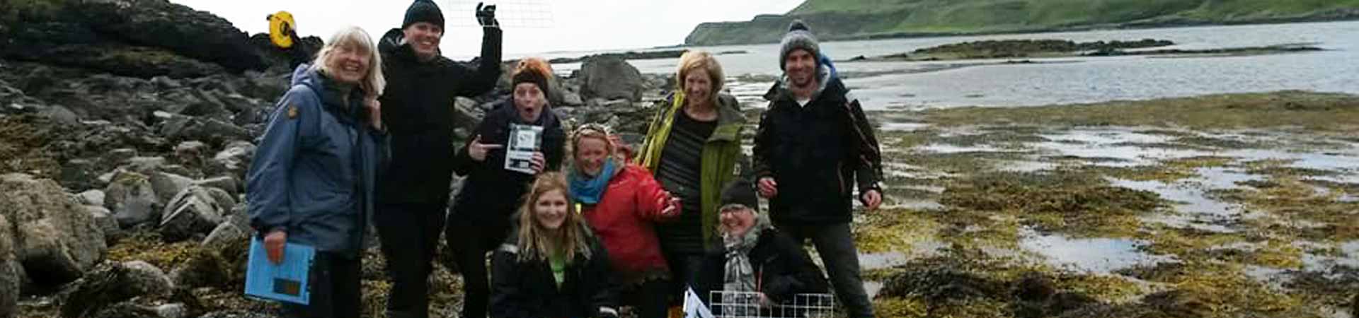 A group of volunteer citizen scientists getting ready to survey a beach