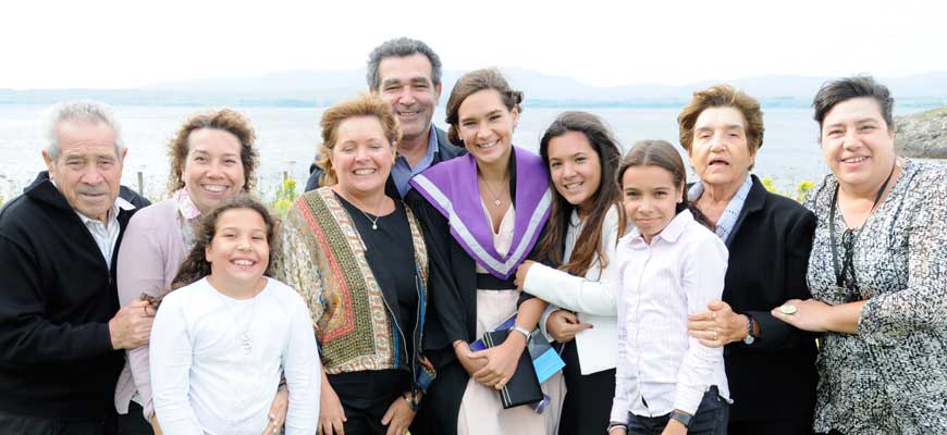 International student with her family at graduation in 2015