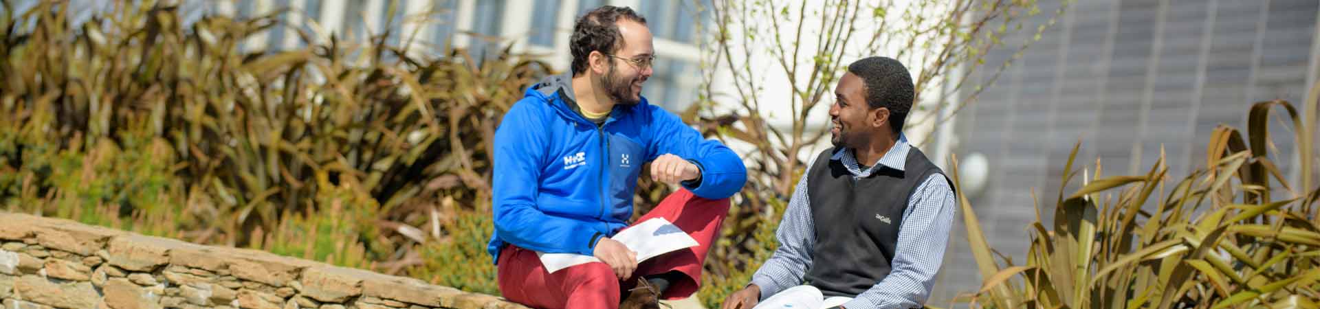 Image showing two international postgraduate students on the SAMS campus