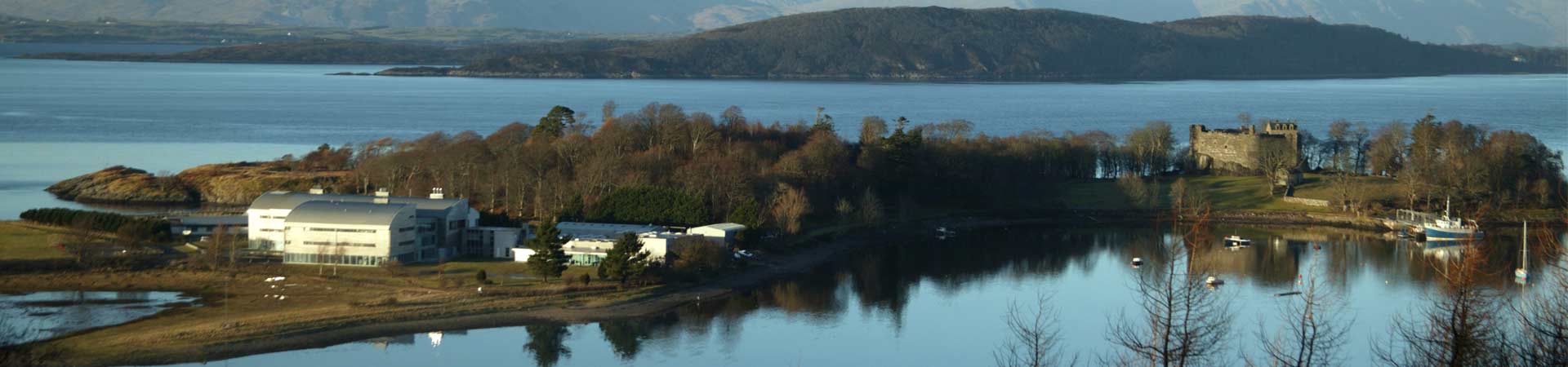 Aerial image showing SAMS campus on the beach at sunset