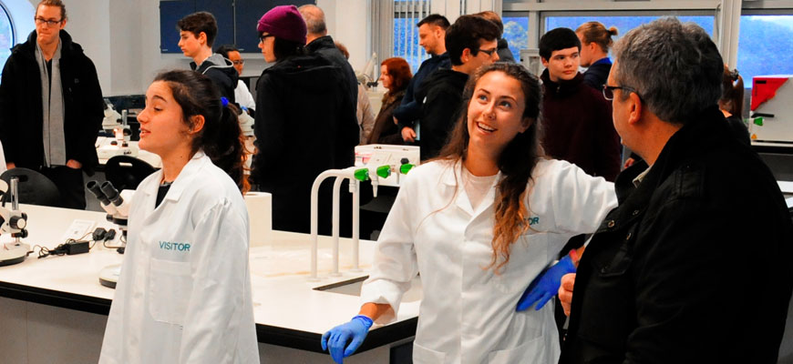 Student ambassadors talking about their experience as a SAMS UHI marine science student during an open day for prospective students and their families and friends