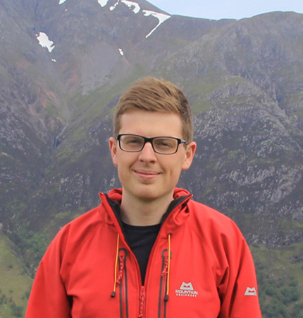 A picture of alumni Paul Rhodes who now works in the oil and gas industry as an exploration geologist