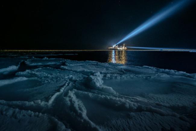 Scientists on board the RV Helmer Hanssen working during the polar night (photo: Michael O. Snyder)