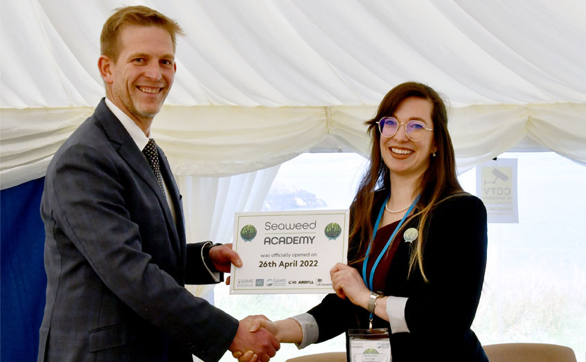 Laurence Rockey, Director of the UK Government's Scottish Office, and Seaweed Academy co-ordinator Rhianna Rees officially open the Seaweed Academy at SAMS