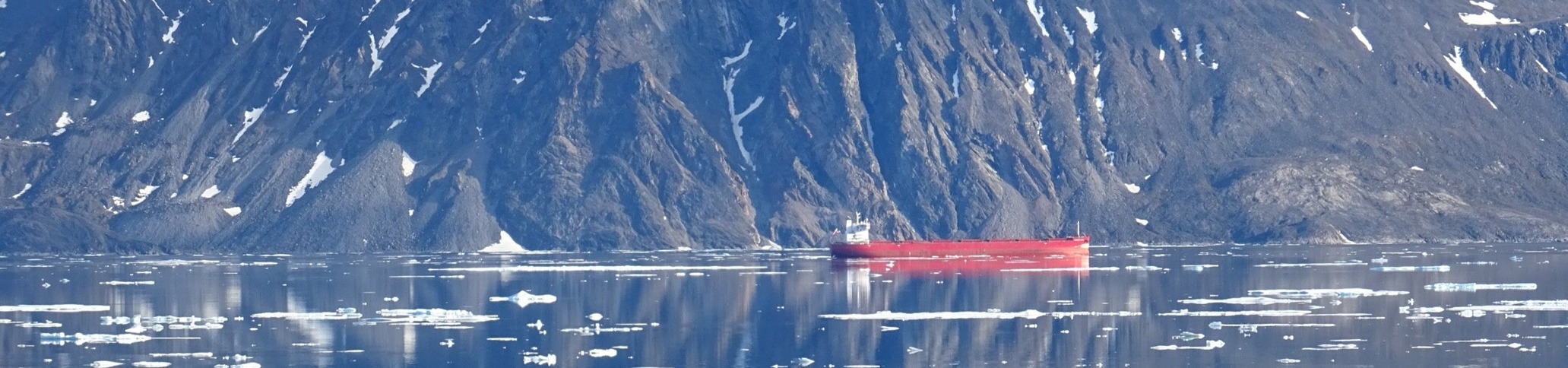 Ship transiting close to Pond Inlet, Baffin Island. Credit: Alison Cook